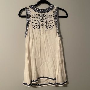 White sleeveless top with navy blue embroidery detail on front & back NWT